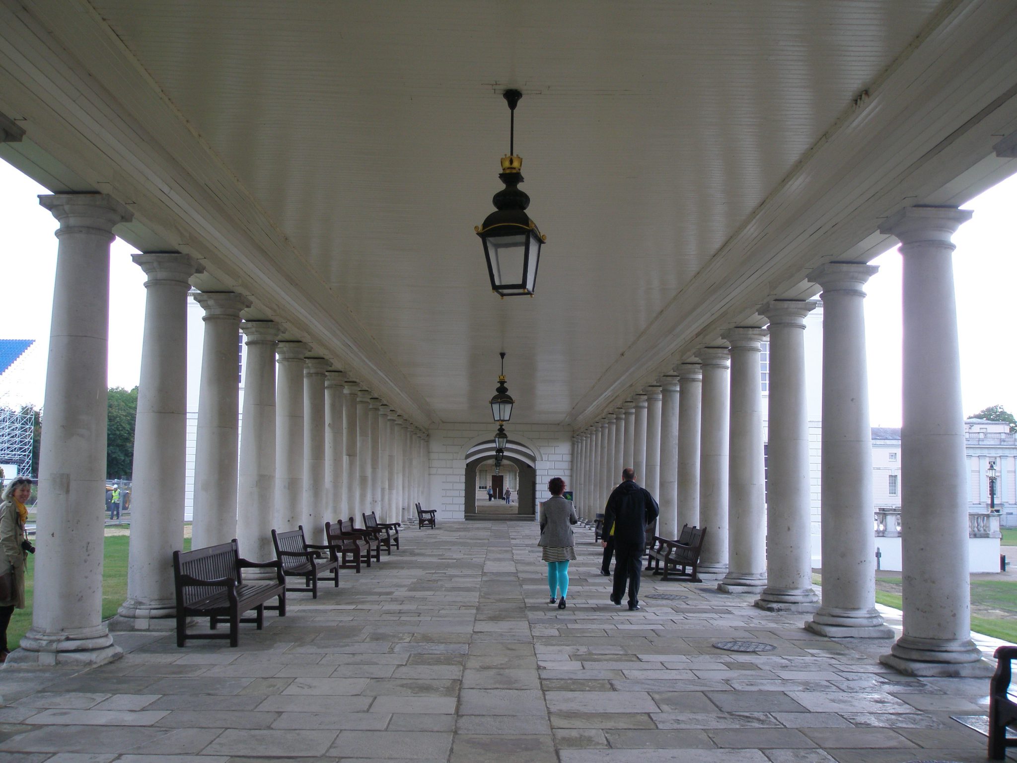 The "King's Side," or East Colonnade of The Queen's House...with Anne (to the left) peeking at me from behind a column.