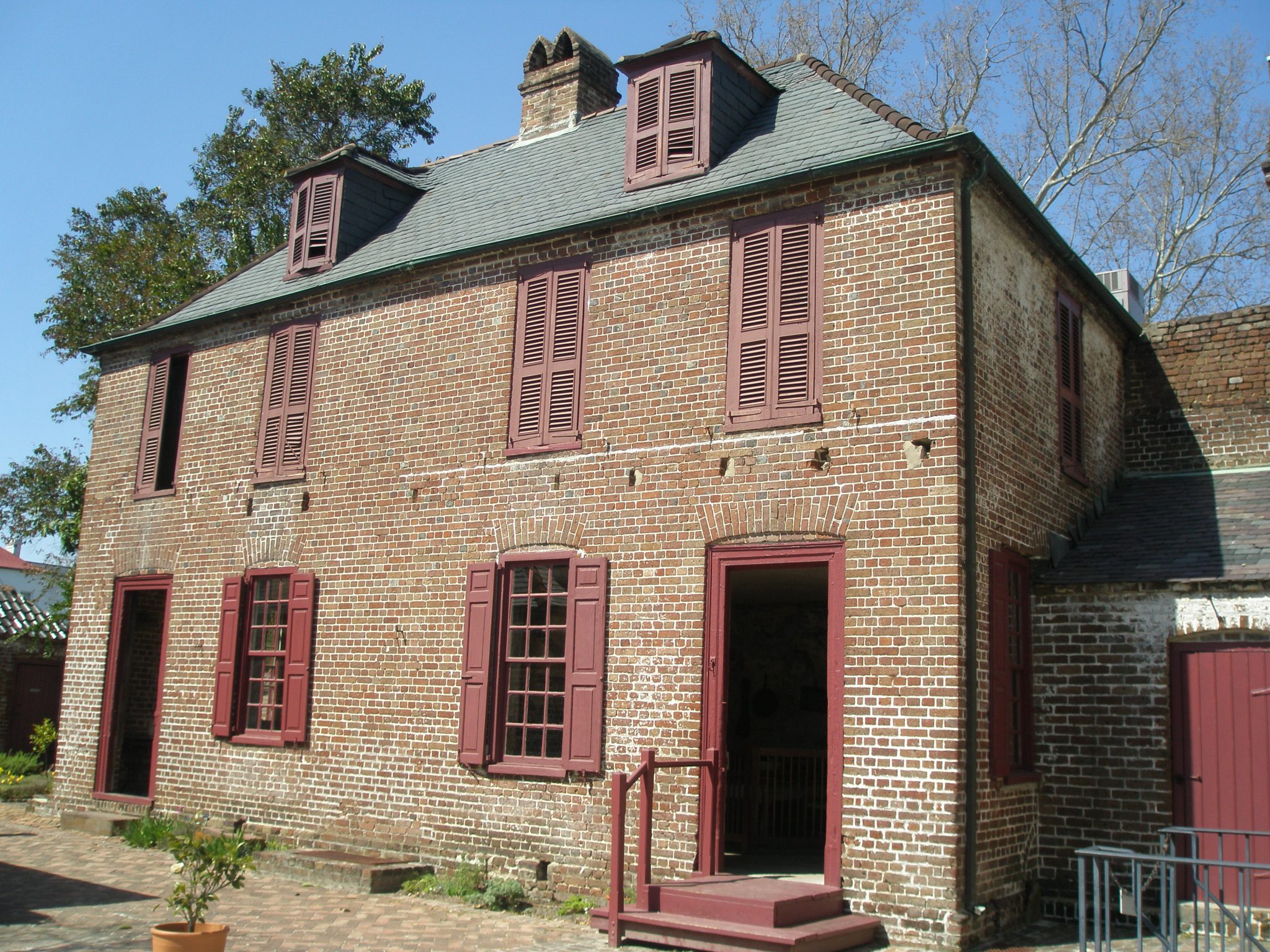 Separate from the main house: the Kitchen & Laundry Building. As a method of fire-prevention, most Charleston homes were built with outbuildings to contain necessarily inflammatory activities such as cooking and heating water.