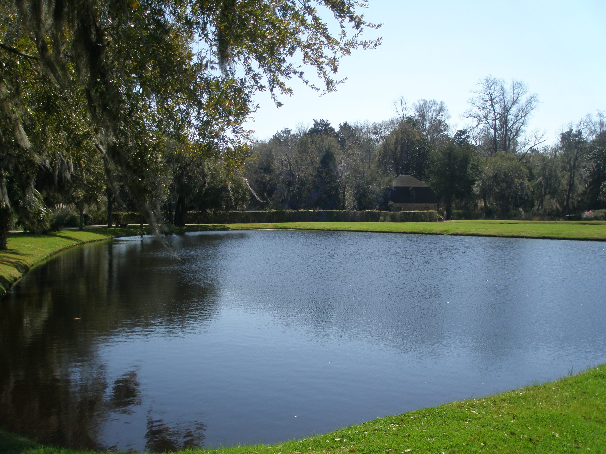 View from the base of one of the Butterfly Lakes toward the Spring House/Plantation Chapel.