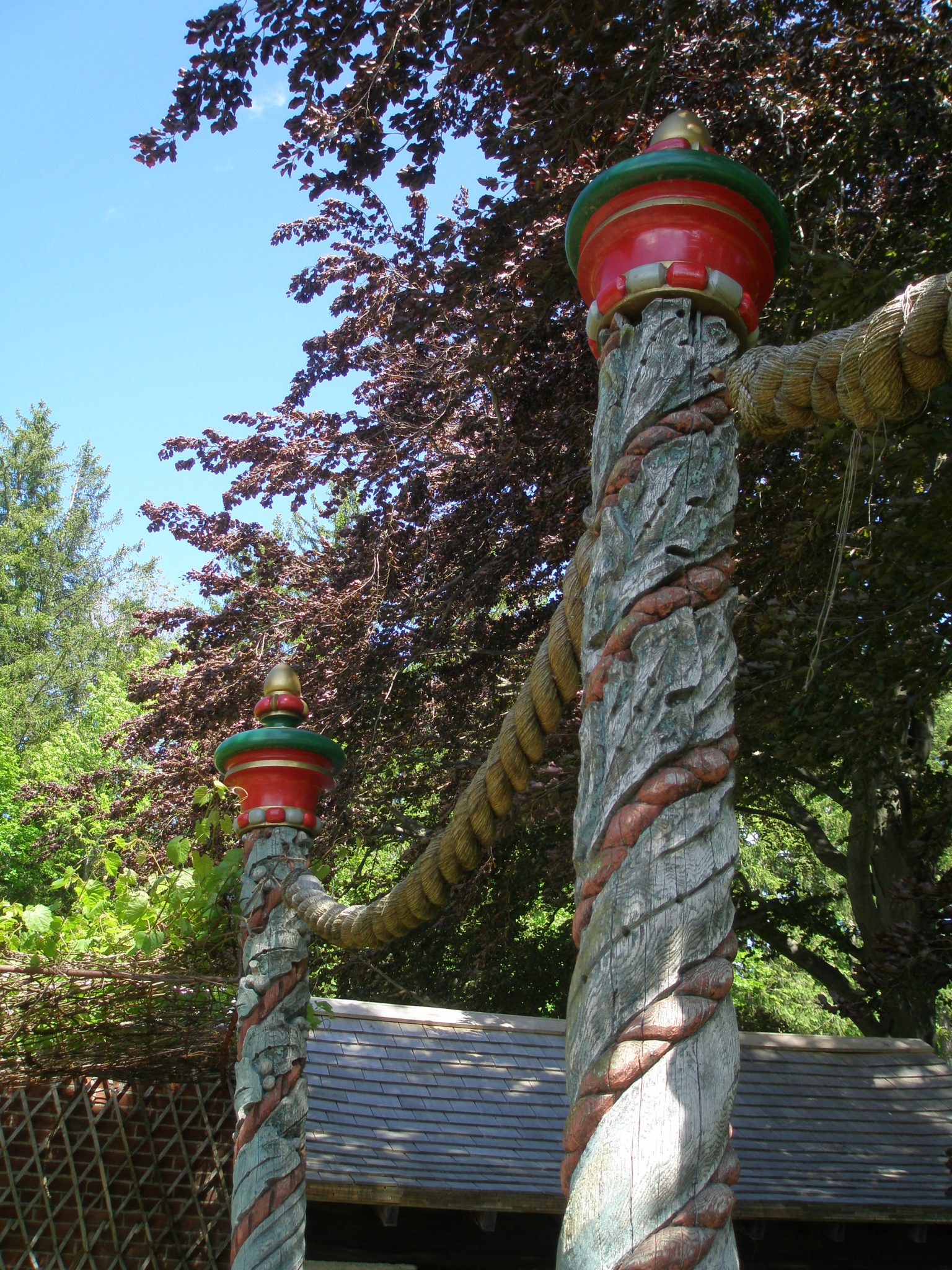 The Afternoon Garden's carved and gaily-painted oak columns