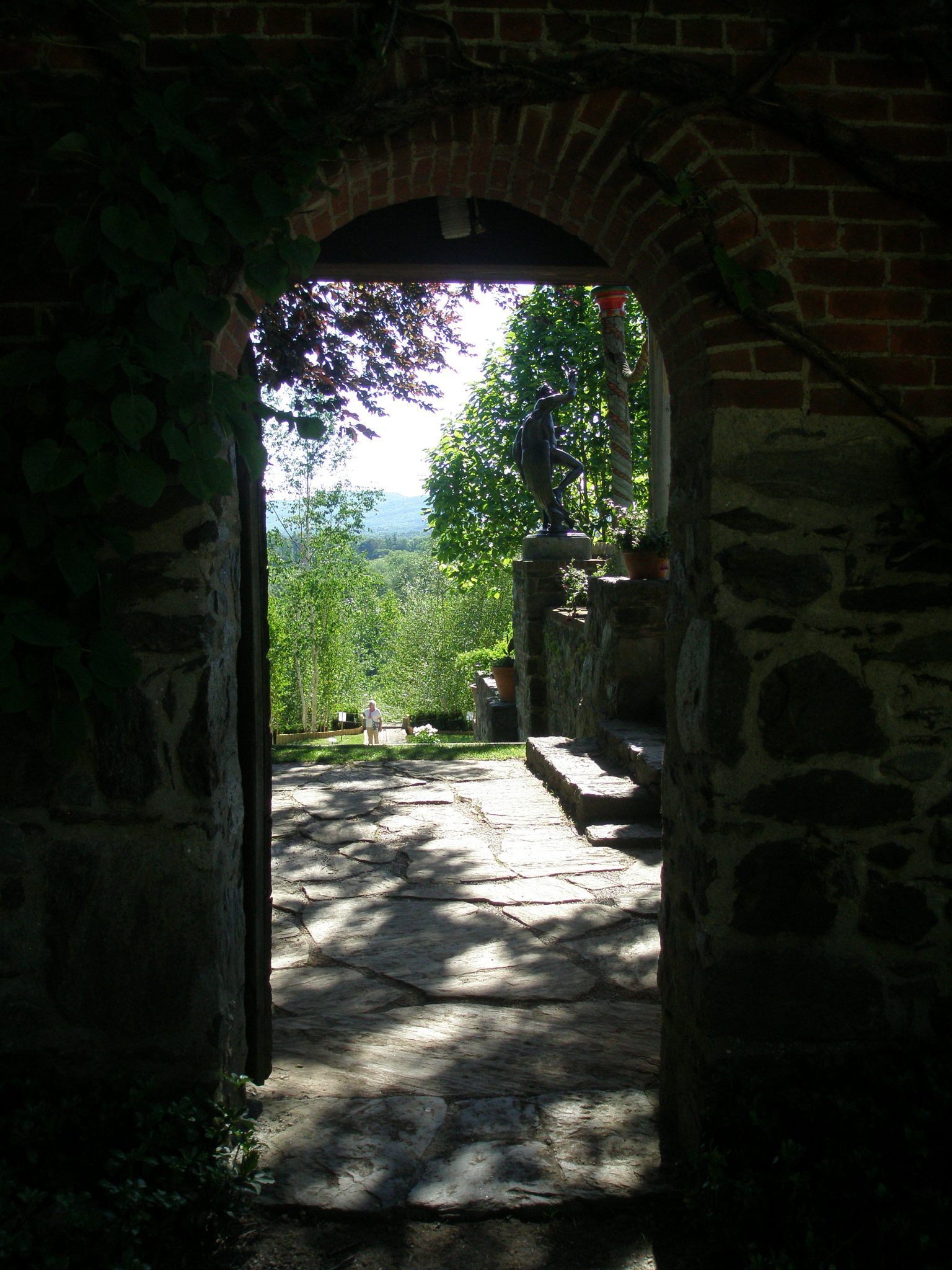 View from the the Service Court through the Gate, and down toward the Water Runnel and the Blue Steps