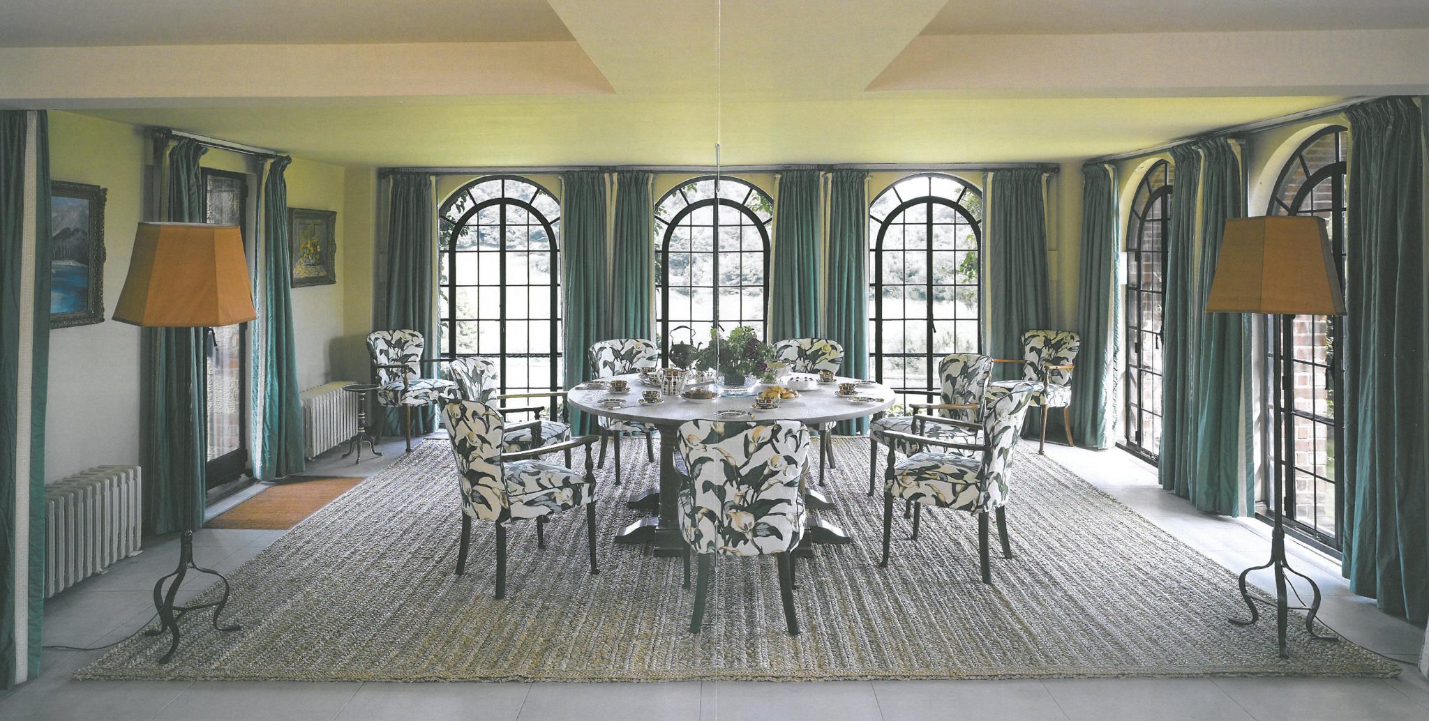 I adored the basement-level Dining Room, which has windows on three sides. The sea-grass carpet is woven specially for this space and the room is suffused with the fresh aroma of that grass. This rug is regularly replaced, so as to maintain the clean smell that Winston enjoyed. The vivid glazed chintz covering the chairs is the same pattern--"Arum Lily"--that has always decorated the room.