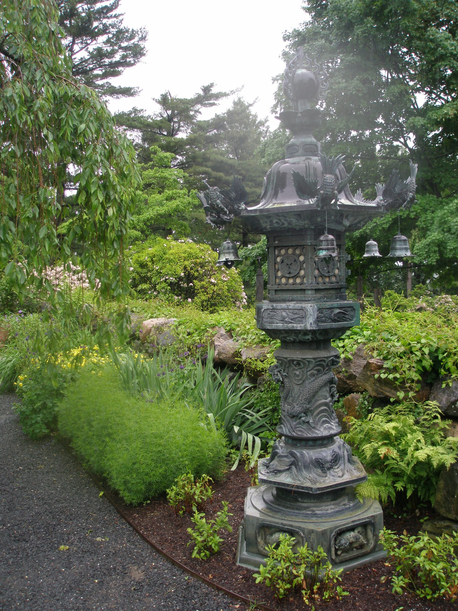 Japanese Bronze Lanterns, which have adorned the Brook Garden since 1908