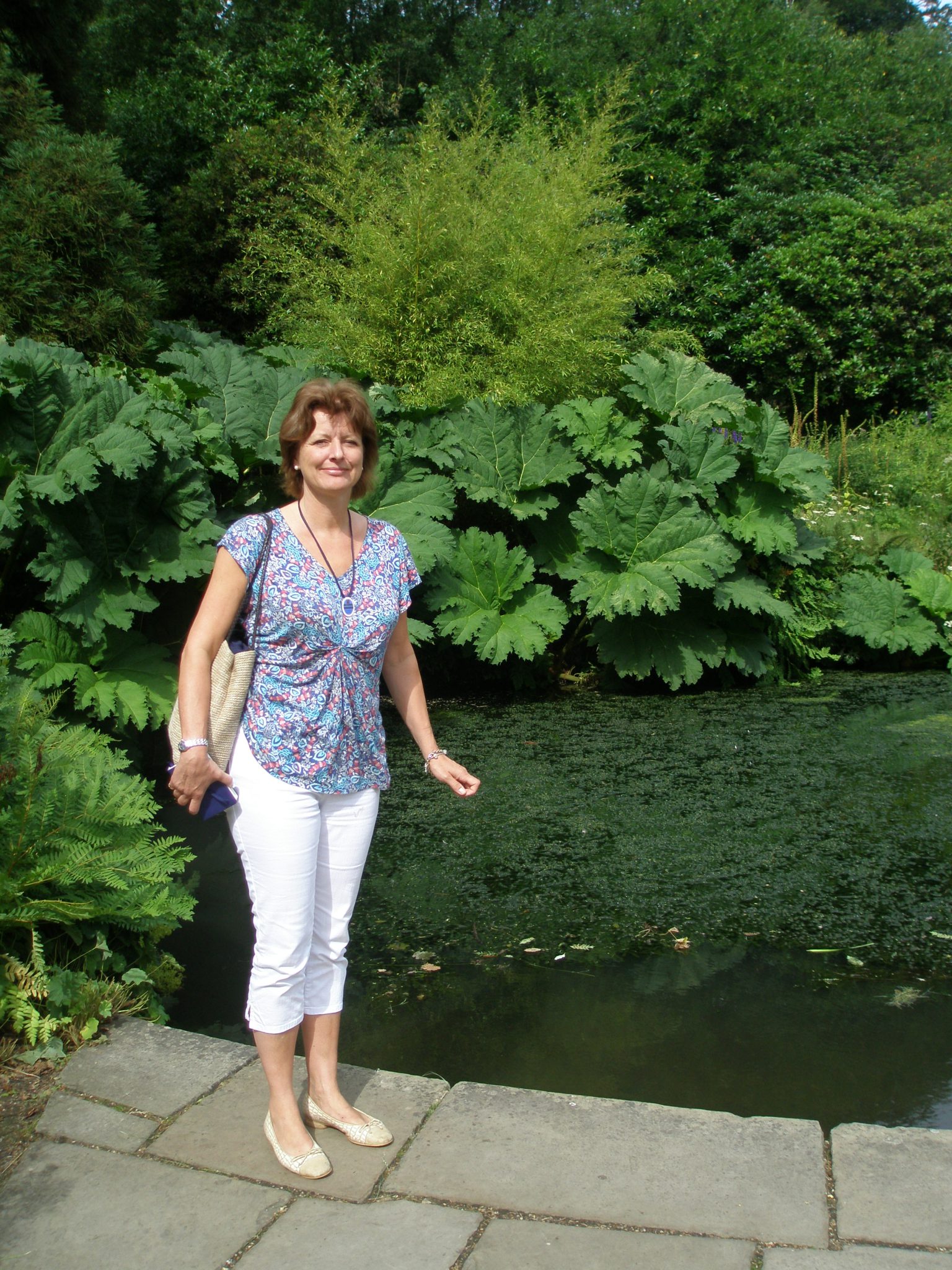 Guide Extraordinaire: Amanda Hutchinson, by Winston Churchill's koi-pond, at Chartwell, on August 5, 2013.