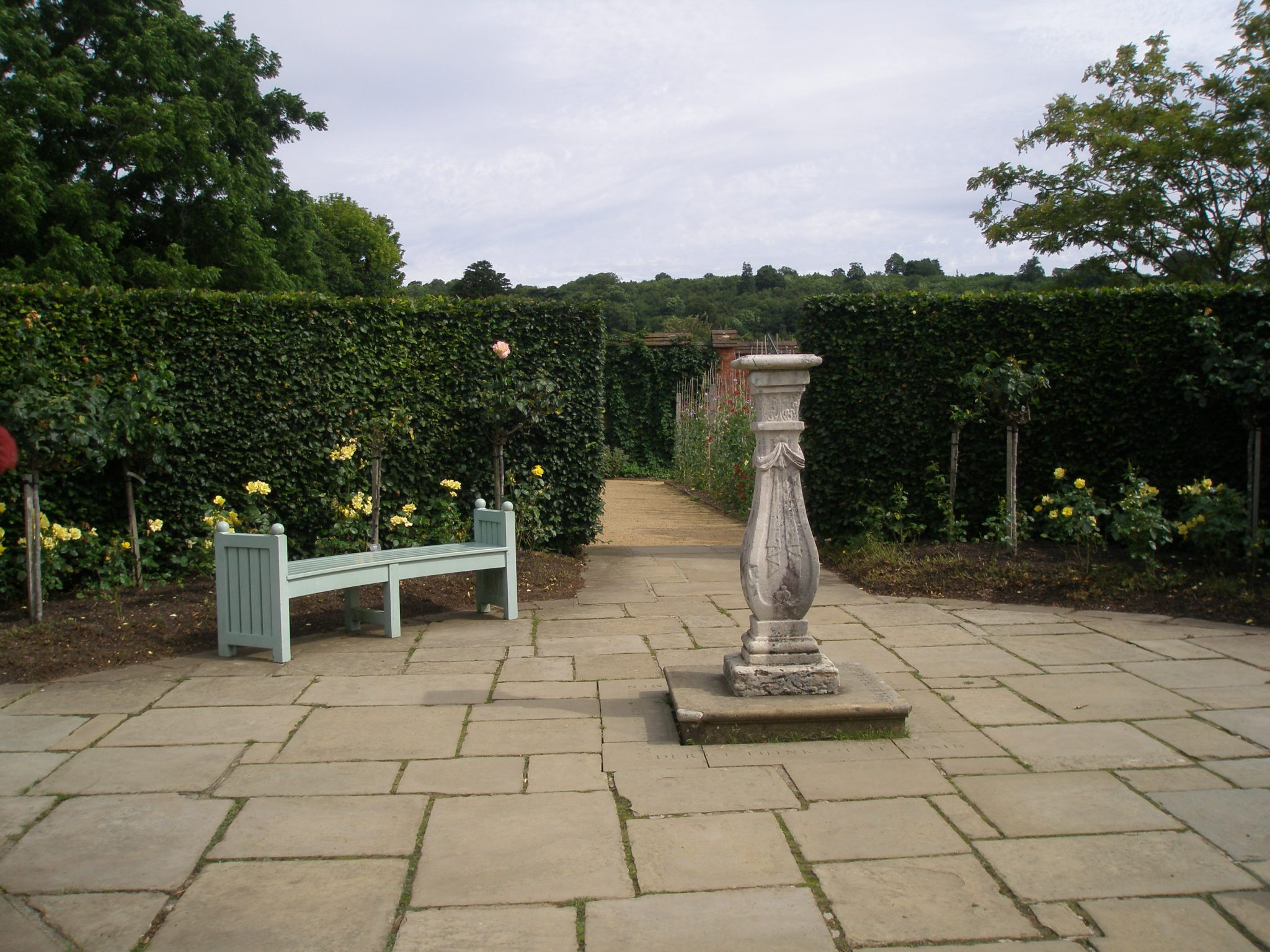 Midway along the Golden Rose Avenue is a circular terrace with a sundial. Below the sundial is buried a pet dove that Clementine brought home from a cruise to Bali in 1935. The dove survived for 2 or 3 years at Chartwell. Chartwell's gardens are full of personal touches.