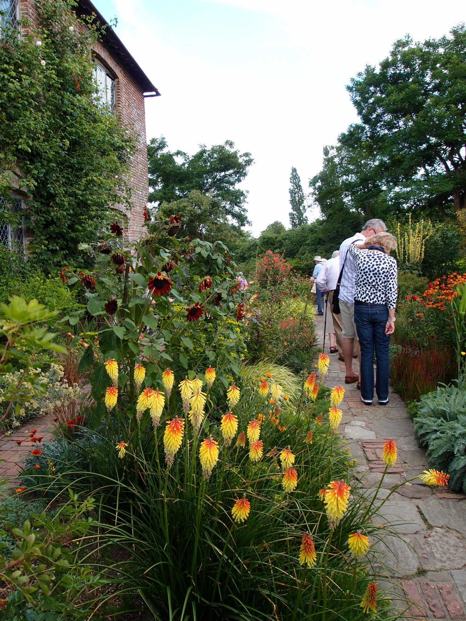 Leaving the Rose Garden, we entered the small Cottage Garden, which is always planted with rich orange, red and yellow flowers.