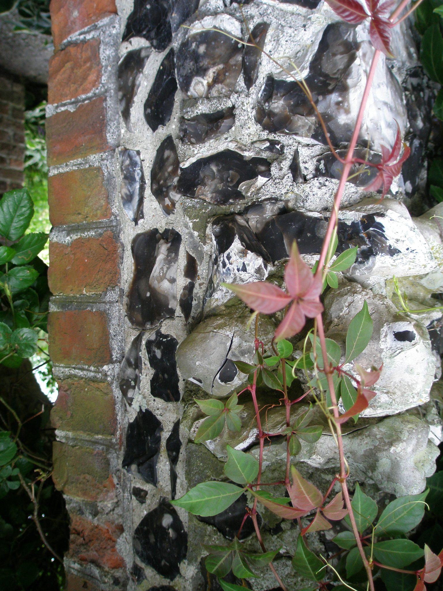 A closer look at the split-flint decoration on the Walled Garden arch.