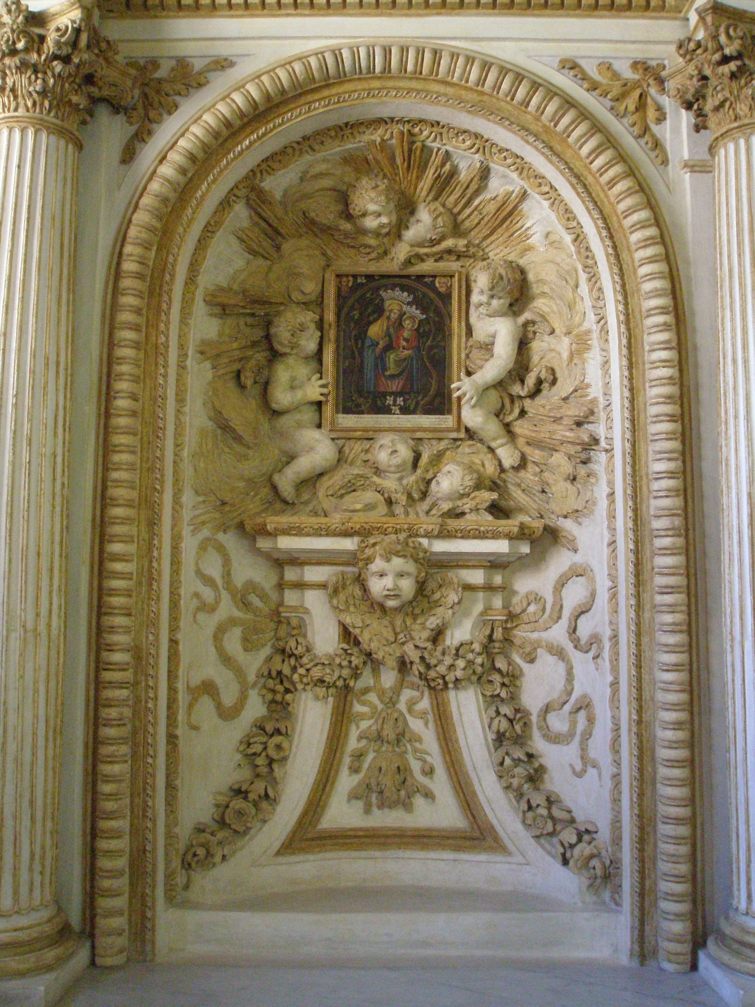 Half-way up La Scala Borrominiana is this wonderful wall relief.