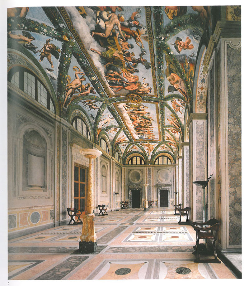 The Loggia of Cupid & Psyche. This enormous hall was the space through which the Villa was originally entered. The hall measures 60 feet long, by 21 feet deep, and has a ceiling height of about 25 feet. The frescoes were painted in 1518 by Raphael and his assistants. Image courtesy of LA VILLA FARNESINA A ROMA, published by Franco Cosimo Panini.