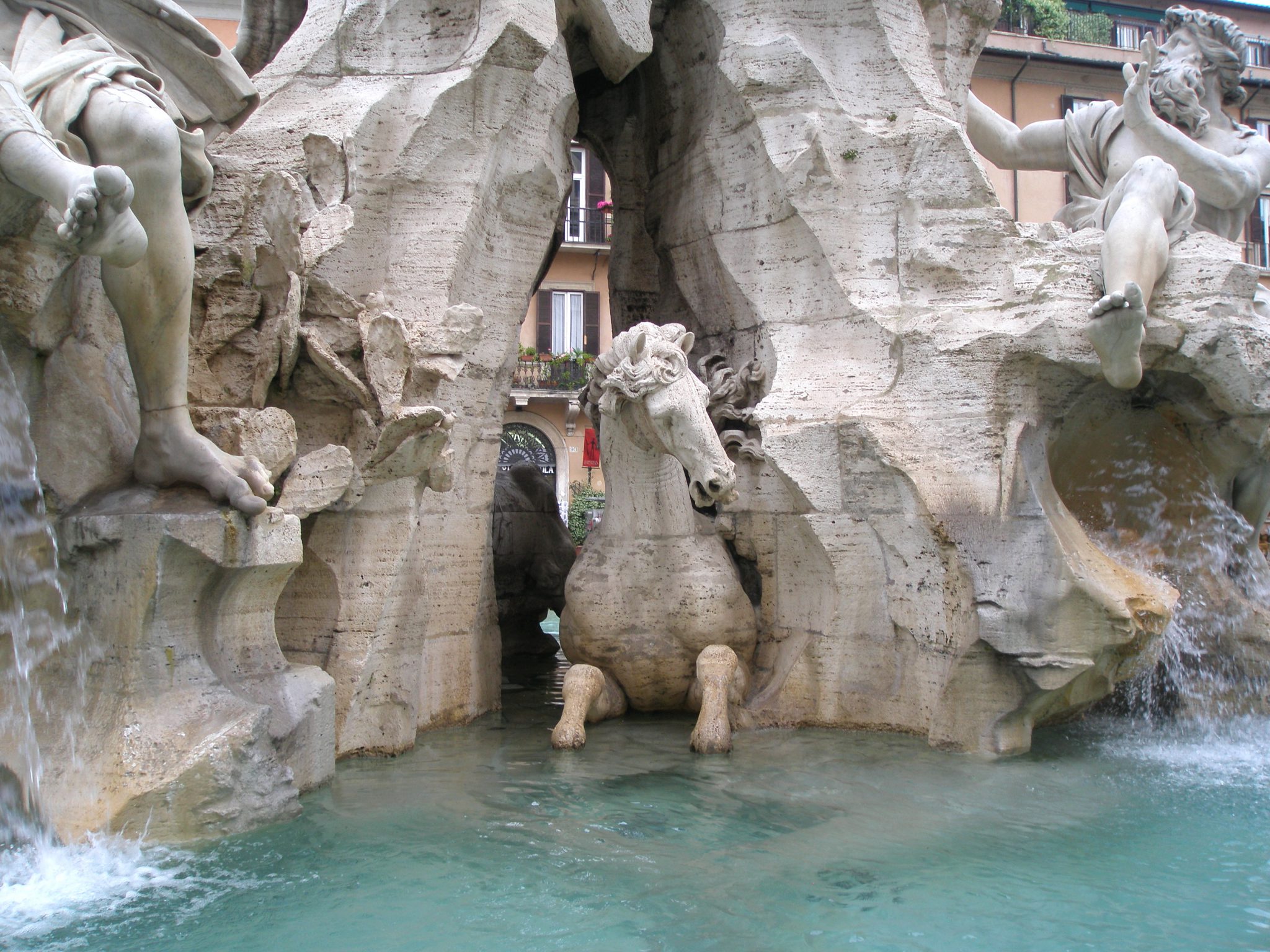 We're back to our rainy morning in May with a detail of Bernini's ingeniously-carved travertine base.