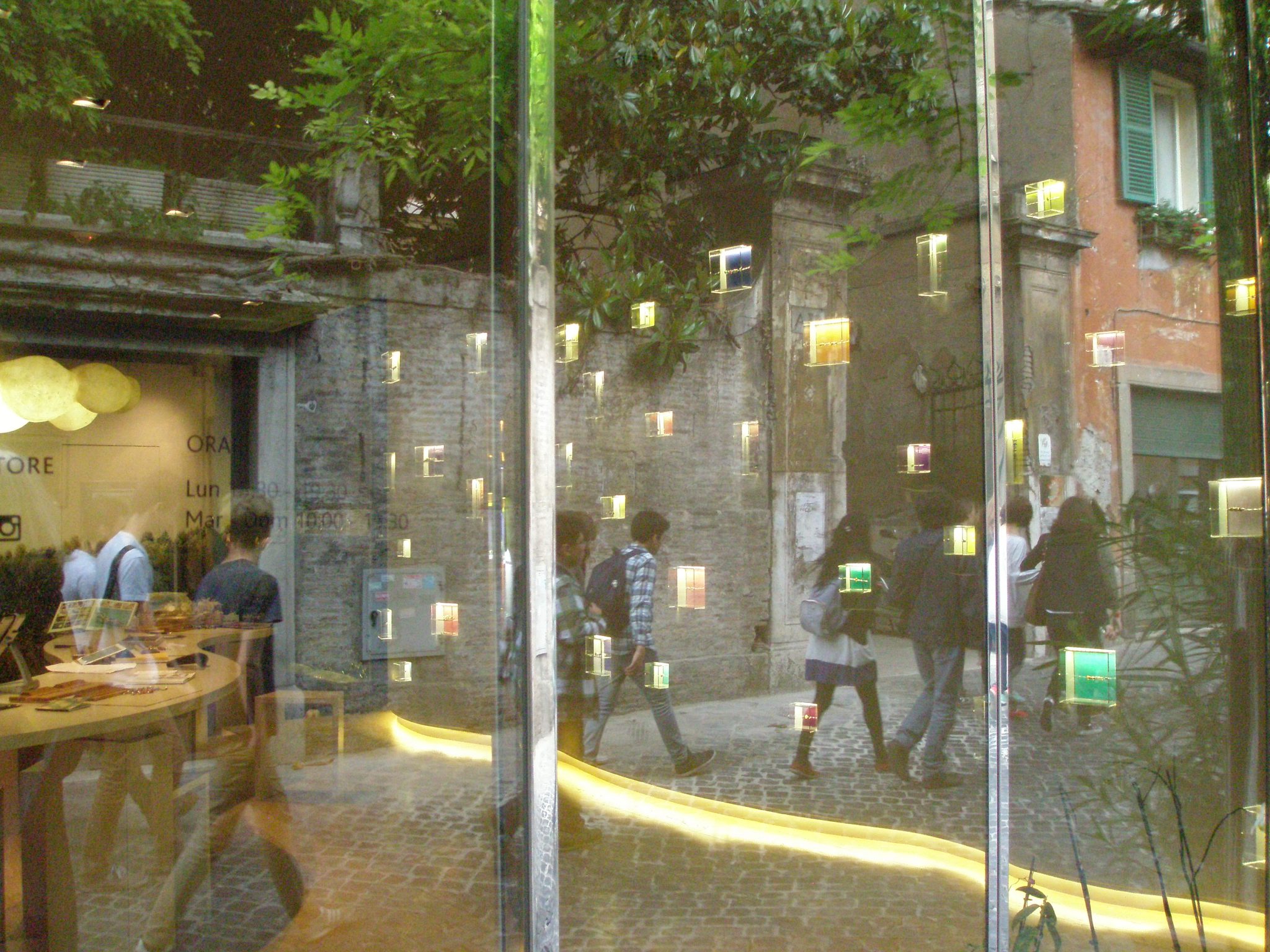 Mesmerizing reflections on the windows of a Via Margutta boutique.