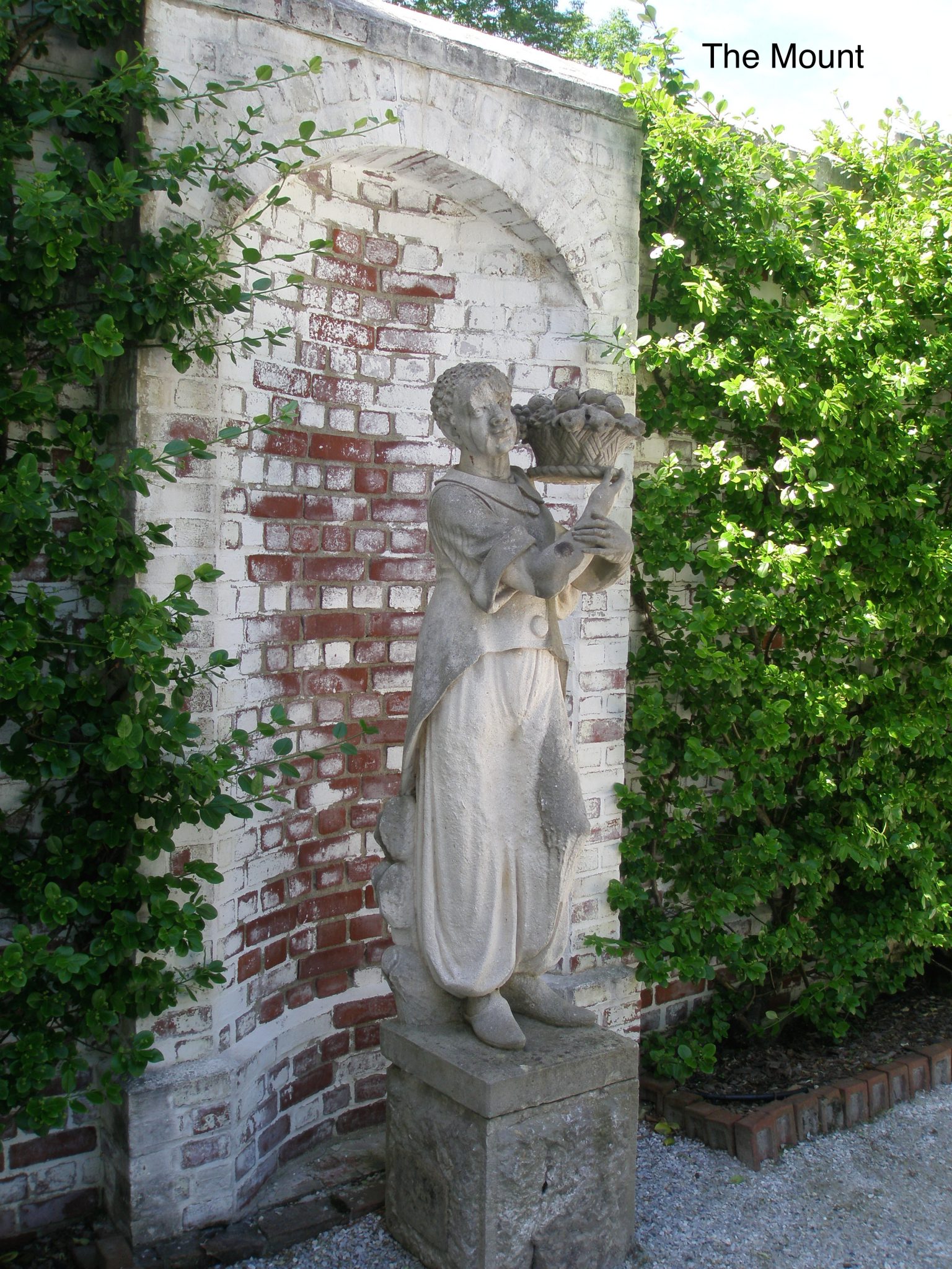 A Statue, circa 1901, in the walled Forecourt of the Main House