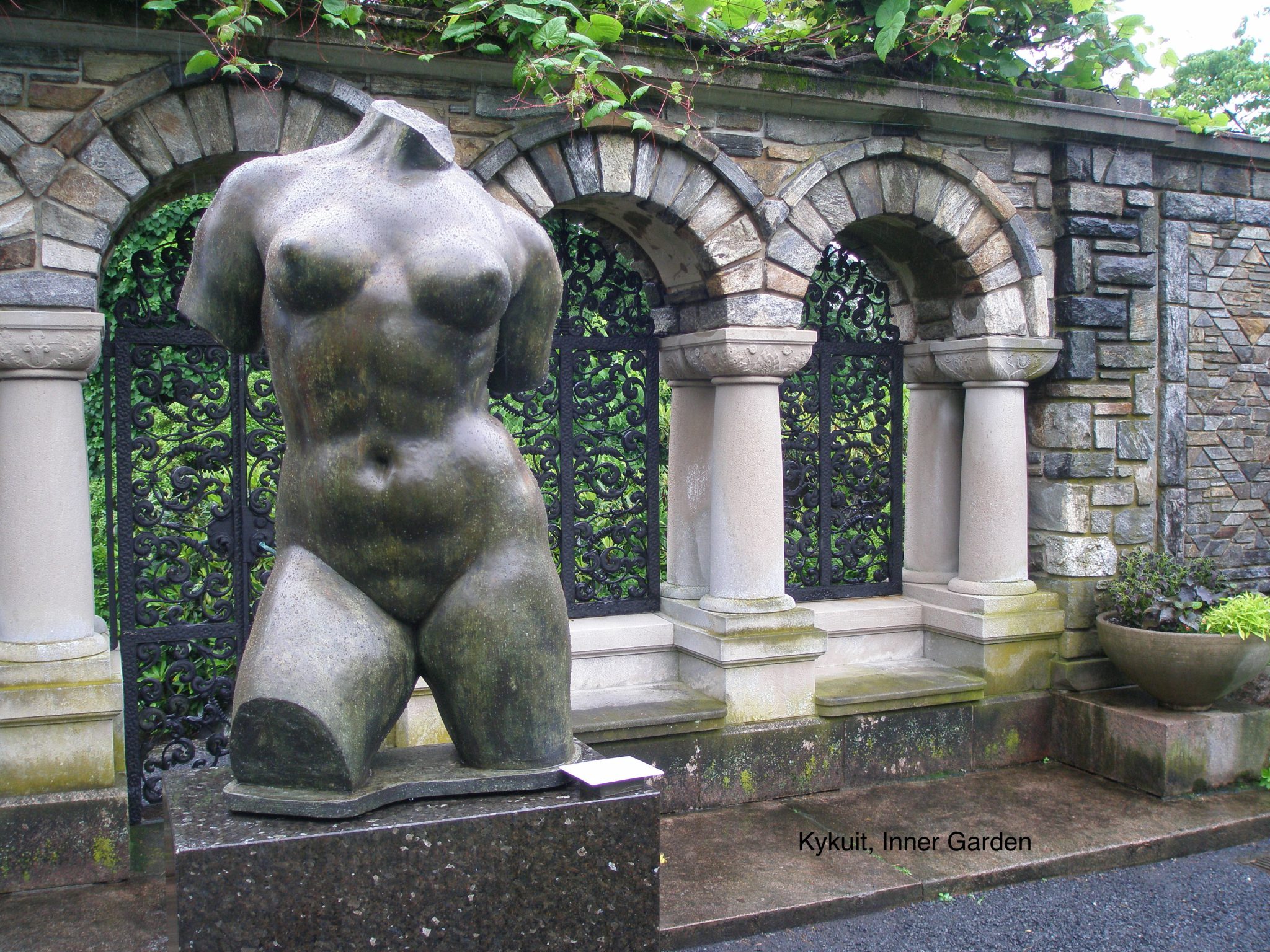 A bronze, by the wall that separates the Inner Garden from the Brook Garden