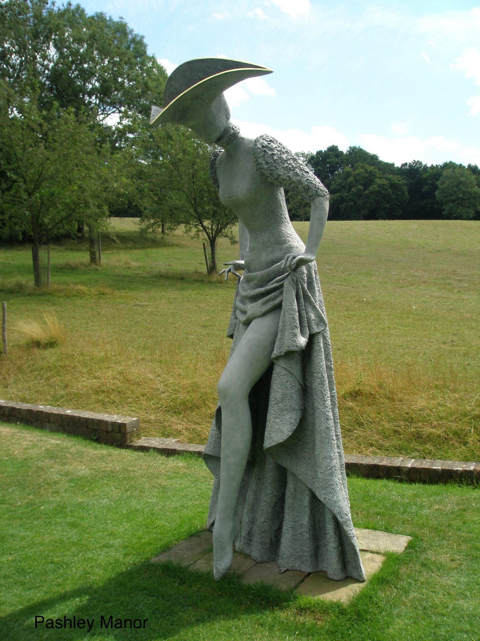 At the edge of the Ha-Ha that separates the gardens from sheep meadows, this 8 foot tall lady exposes her shapely leg.