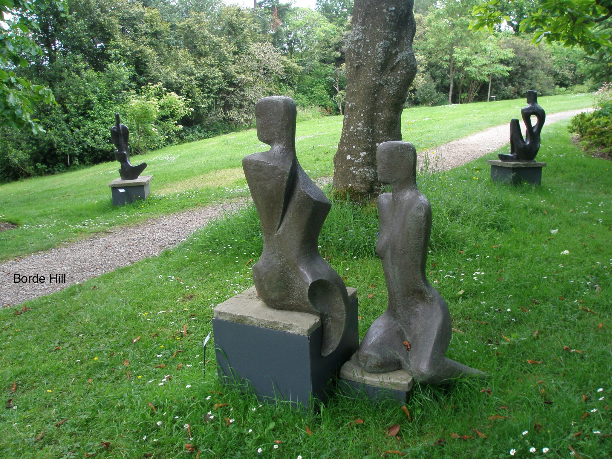 A grouping of figures, in the Arboretum