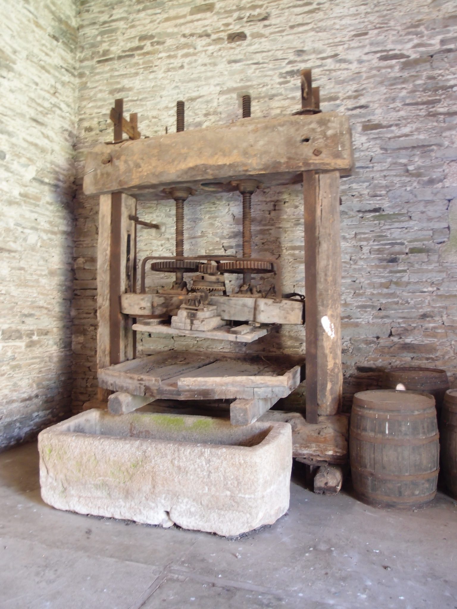 An 18th century Cider Press is installed at the north end of the Great Barn.