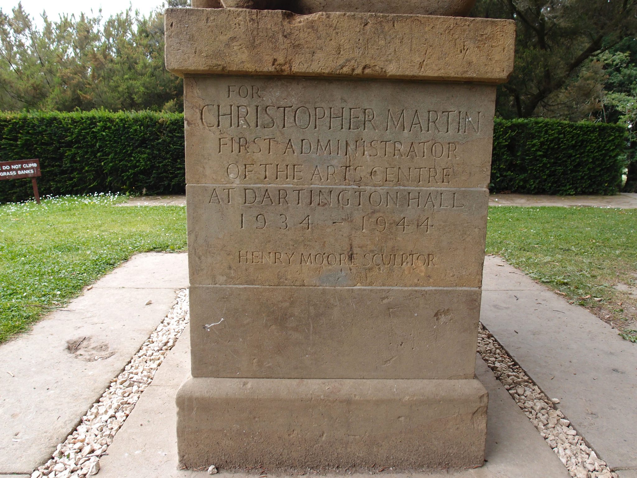 Inscription on pedestal of Moore sculpture.