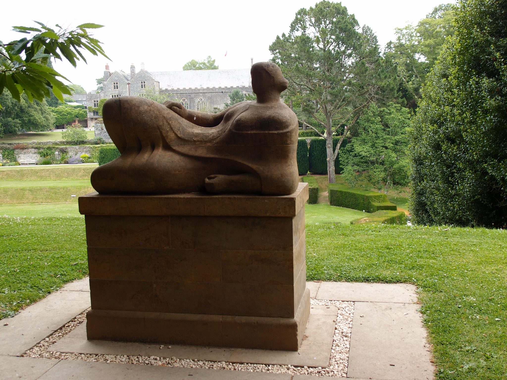 Henry Moore's RECLINING FIGURE lounges above the southwest corner of the Tiltyard.