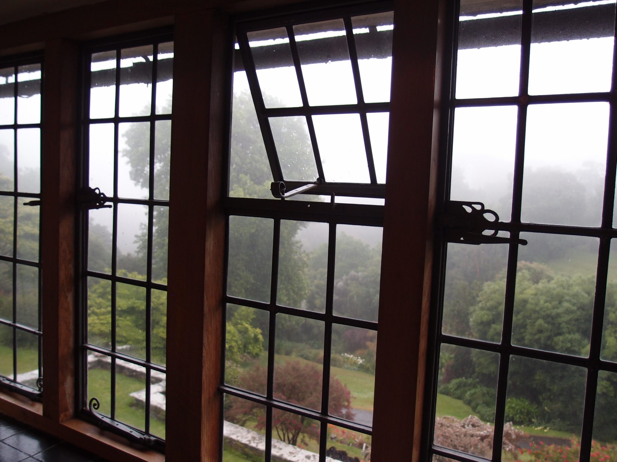  View from the East Bedroom…trust me, despite the blanket of fog outside in this photo, you WILL soon see the gardens. Throughout the house, all of its mullioned windows have ironwork fittings, and are set above black Staffordshire tile sills.